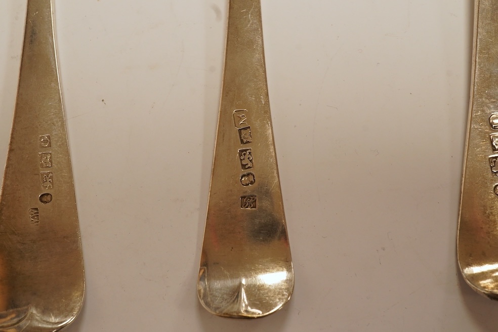 A set of six George III provincial silver table spoons by William Welch II, Exeter, 1807/8 & 1810, with engraved initials, 23cm, 12oz. Condition - fair to good